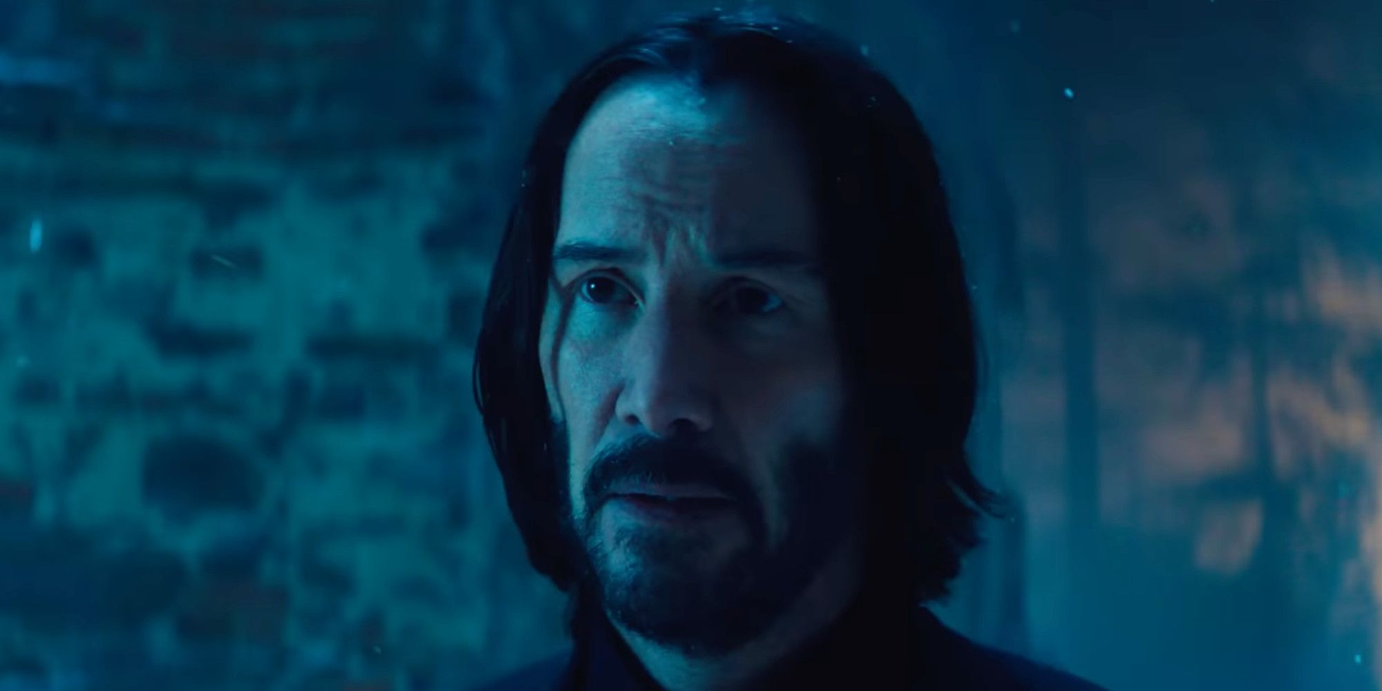 Ballerina Keanu Reeves in intense lighting 