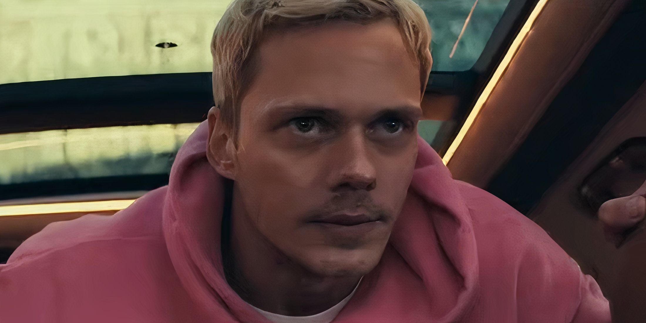 Bill Skarsgard as Eddie looking surprised in Locked