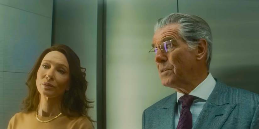 Arthur Stieglitz (Pierce Brosnan) and Kathryn St. Jean (Cate Blanchett) talking in an elevator in Black Bag