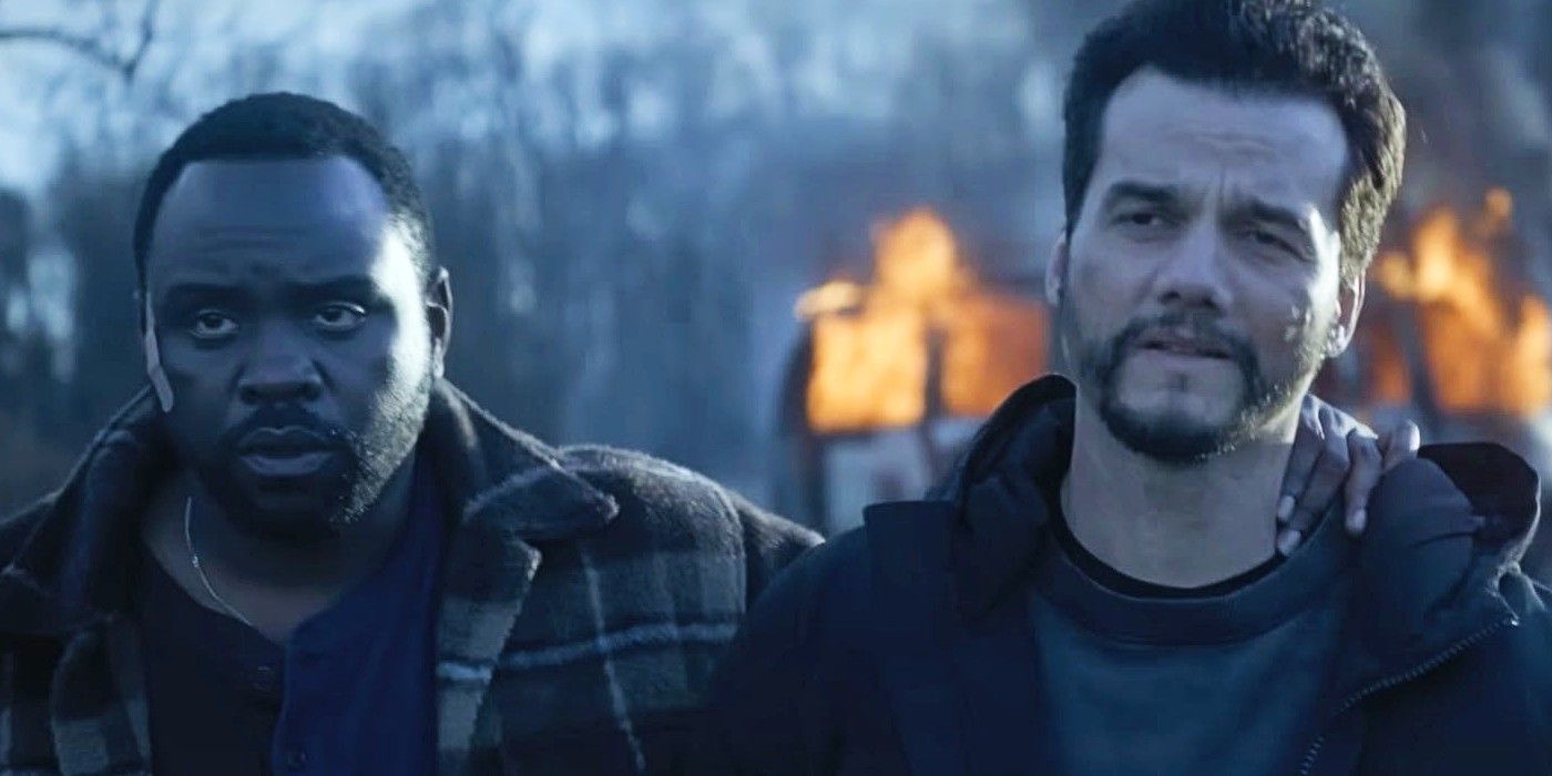 Brian Tyree Henry and Wagner Moura walking away from a fire in Dope Thief