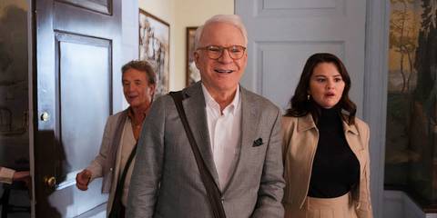 Charles, Mabel and Oliver reacting to something with happy surprise in Only Murders in the Building