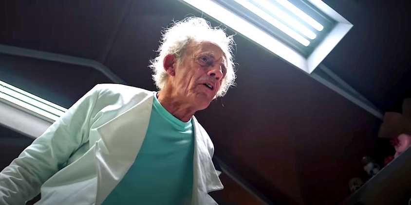 Christopher Lloyd's Rick looks angry in the garage in a Rick and Morty season 5 finale promo