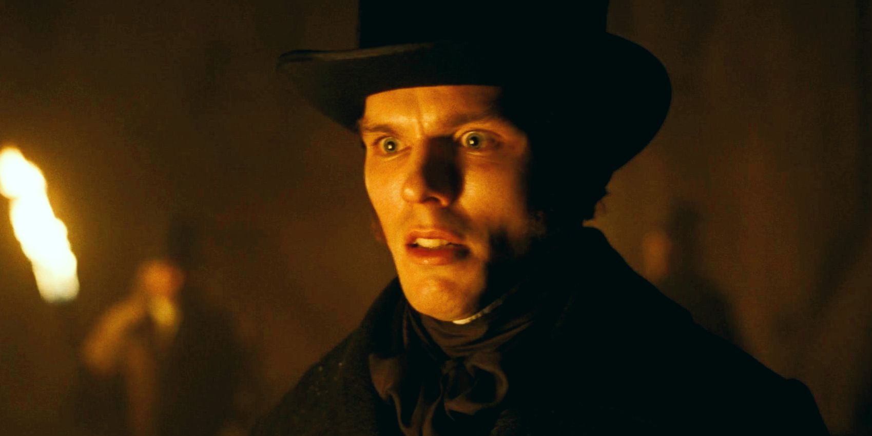 Close up of Nicholas Hoult in Nosferatu cast in shadow