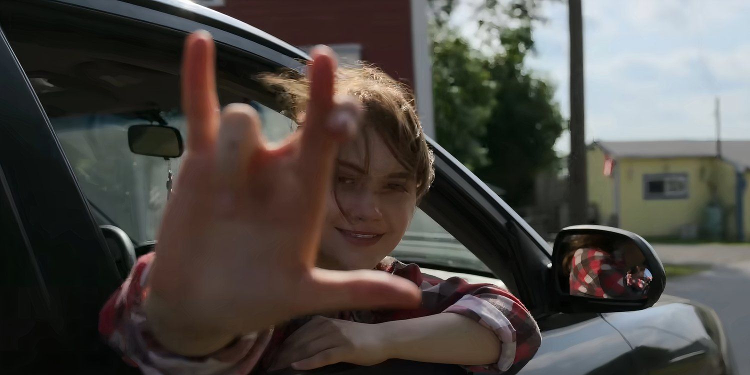 Emilia Jones making a sign with her hand in CODA