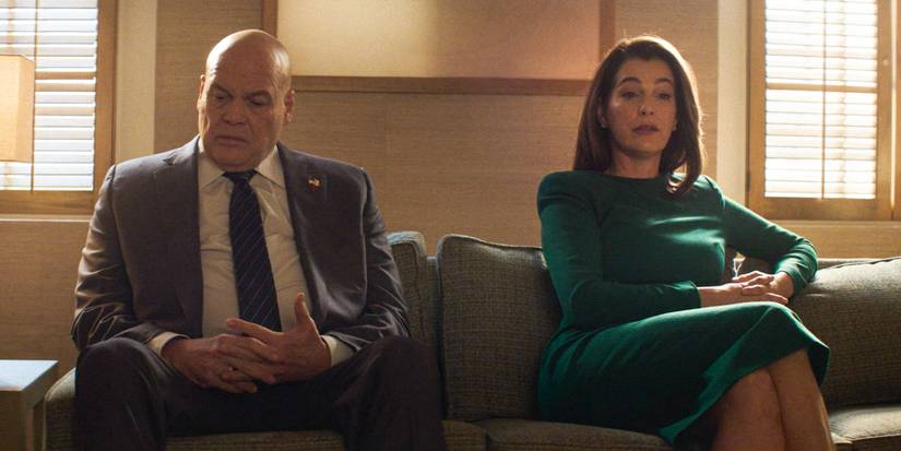 Wilson Fisk (Vincent D'Onofrio) and Vanessa (Ayelet Zurer) sitting on a couch in couples therapy in Daredevil: Born Again Season 1 Ep 4