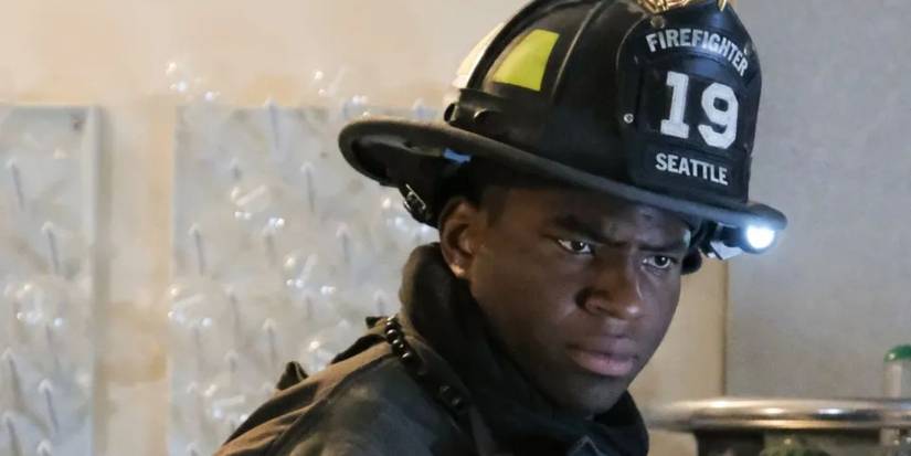 Dean Miller (Okieriete Onaodowan) looking serious in his firefighter's uniform in Station 19.