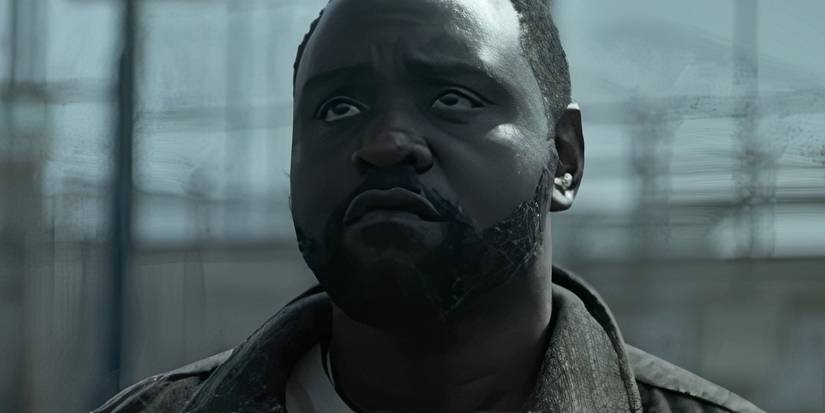 Brian Tyree Henry as Ray standing outside a prison in Dope Thief
