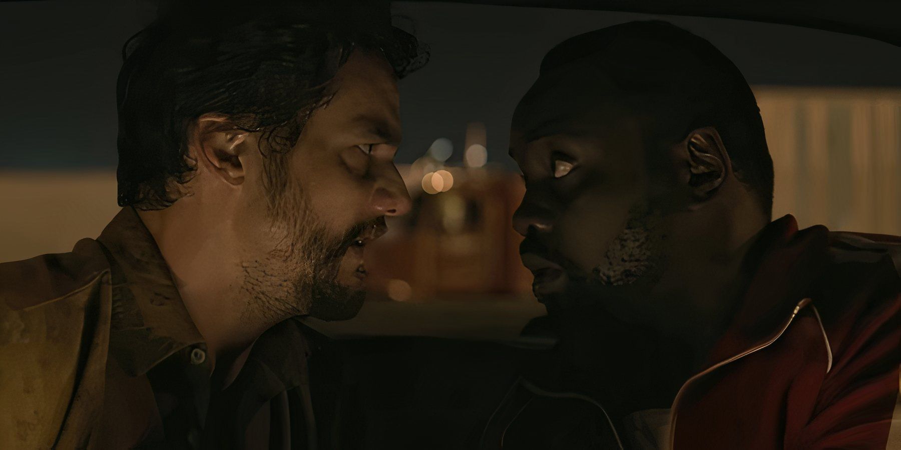 Manny and Ray facing each other closely in Dope Thief