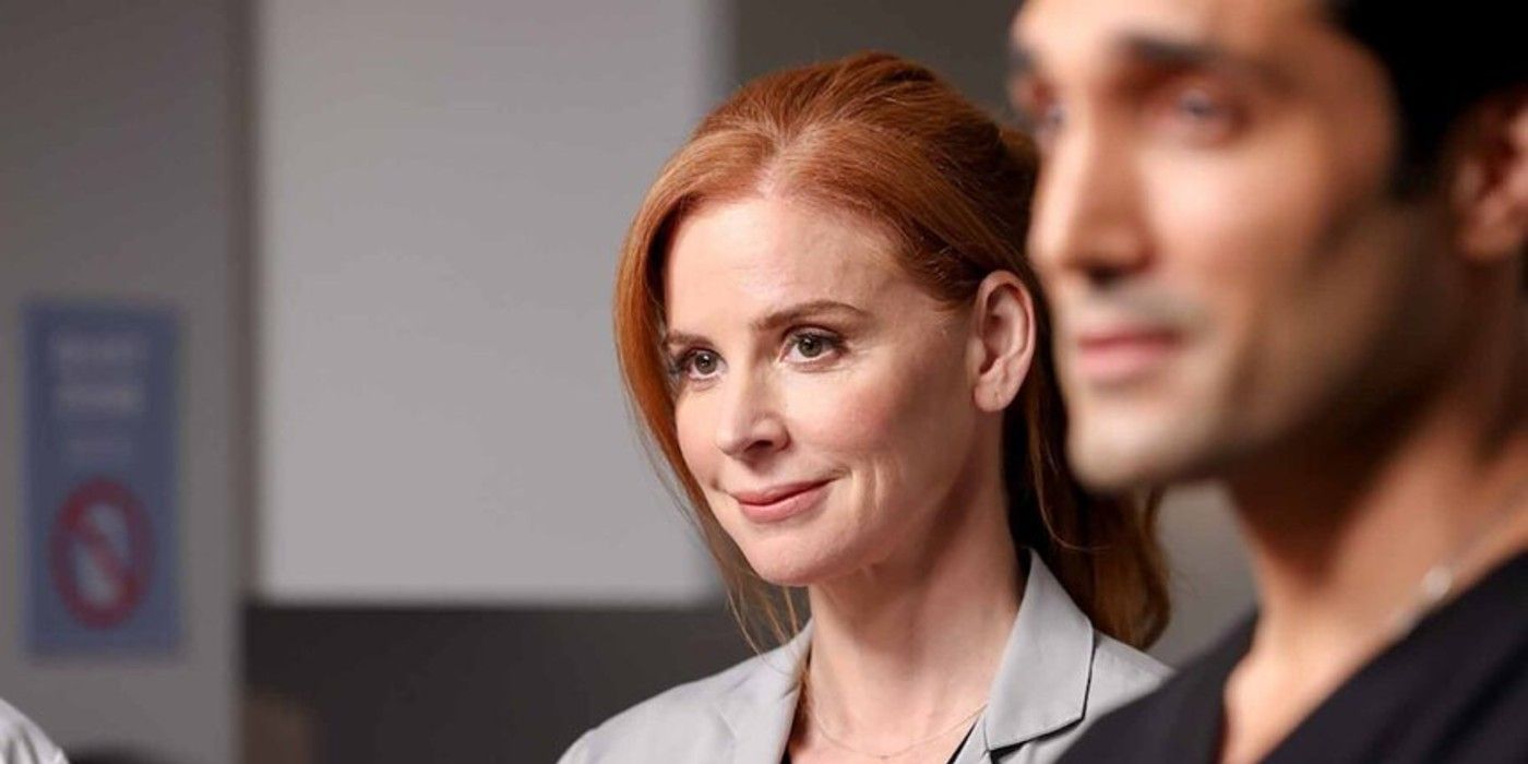 Dr-Pamela-Blake-smiling-next-to-Dr-Marcel-in-Chicago-Med