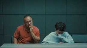Eddie and Jamie sitting in a room in Adolescence