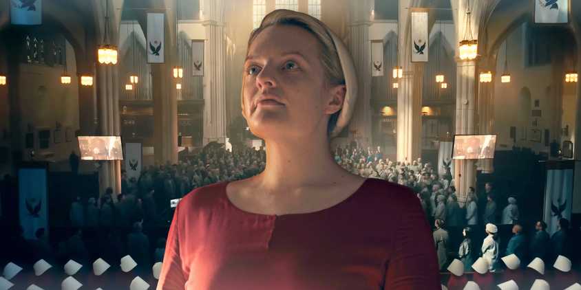 Elizabeth Moss as June looking proud and determined in front of an army of Handmaids in The Handmaid's Tale custom image