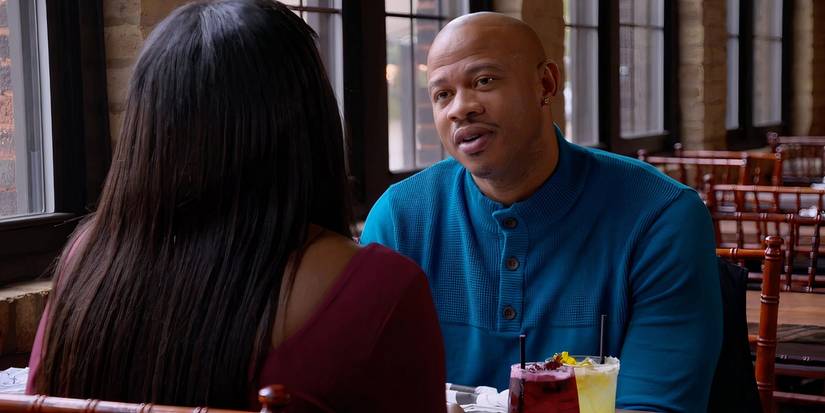 Emem Obot and Brandon Williams on Married At First Sight sitting down in a restaurant