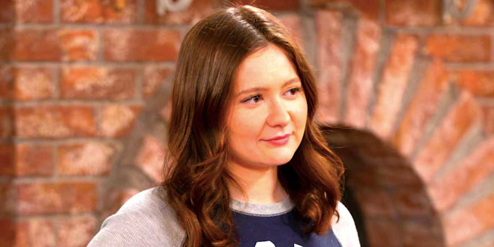 Emma Kenney's Harris smiles fondly in the Lunchbox from The Conners season 6 episode 1