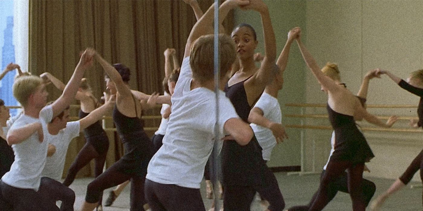 Eva (Zoe Saldana) practicing ballet in a mirrored room in Eva.