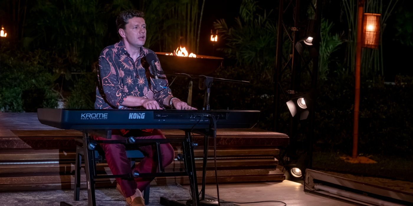 Fabian (Christian Friedel) playing the piano in The White Lotus season 3, episode 7.