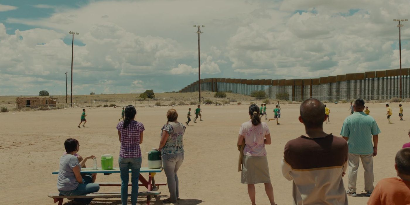 Families and kids playing soccer in Sicario