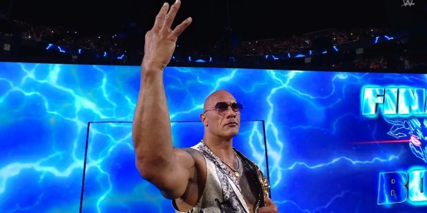 WWE Star The Rock fazendo um 3 com a mão em Bad Blood 2025