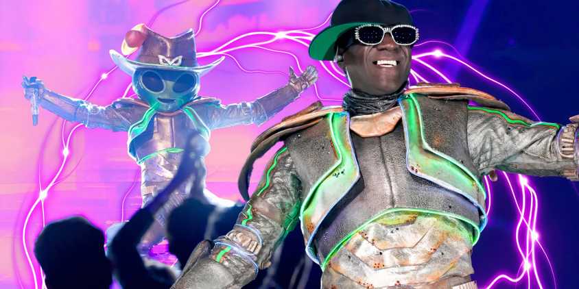 Flavor Flav from The Masked Singer Season 13 singing onstage in out of costume in montage