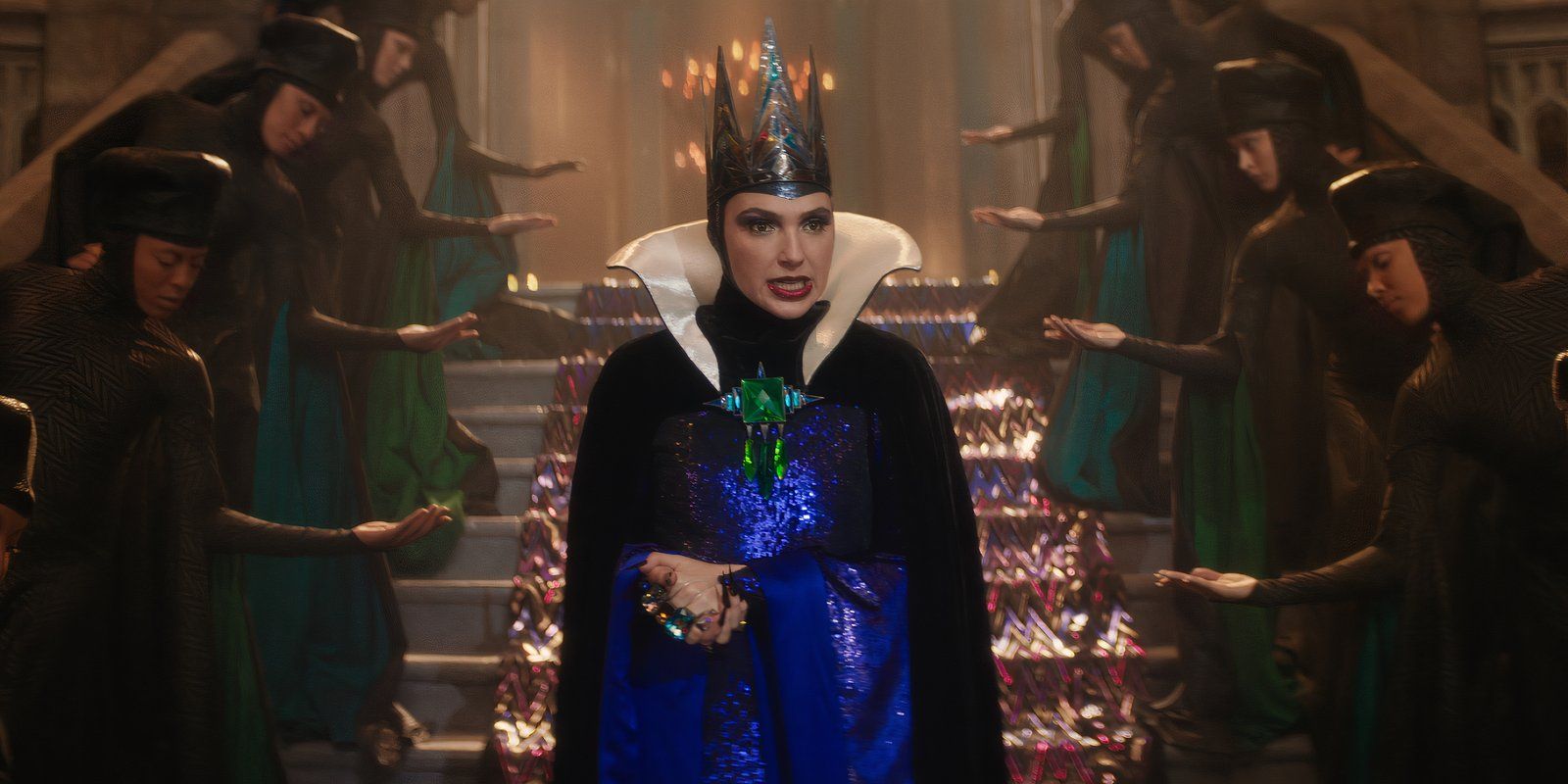 Gal Gadot's Evil Queen walks down the stairs in Disney's Snow White