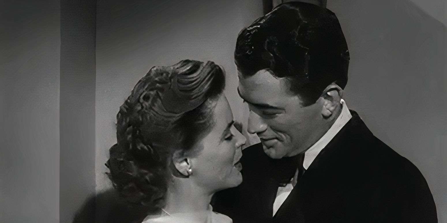 A woman and a man kissing in Gentleman&rsquo;s Agreement