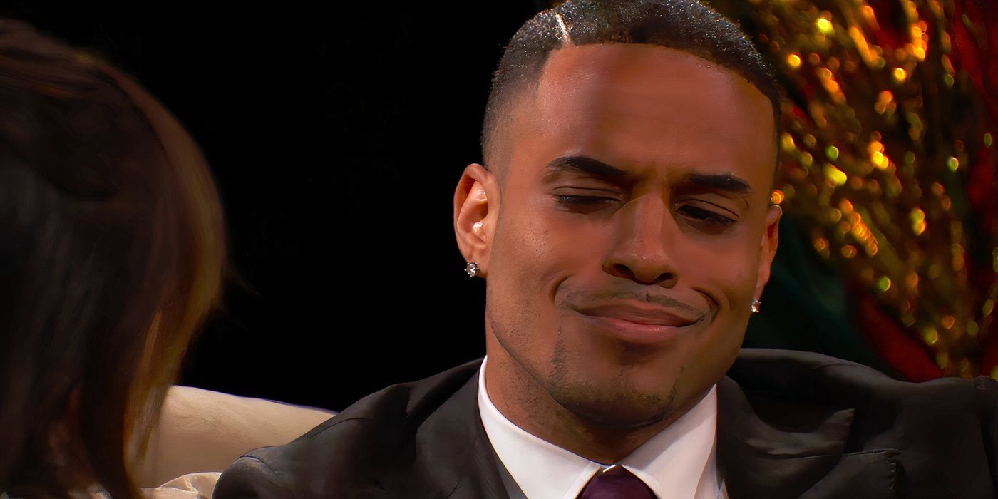 Grant Ellis grimaces with his eyes closed on The Bachelor