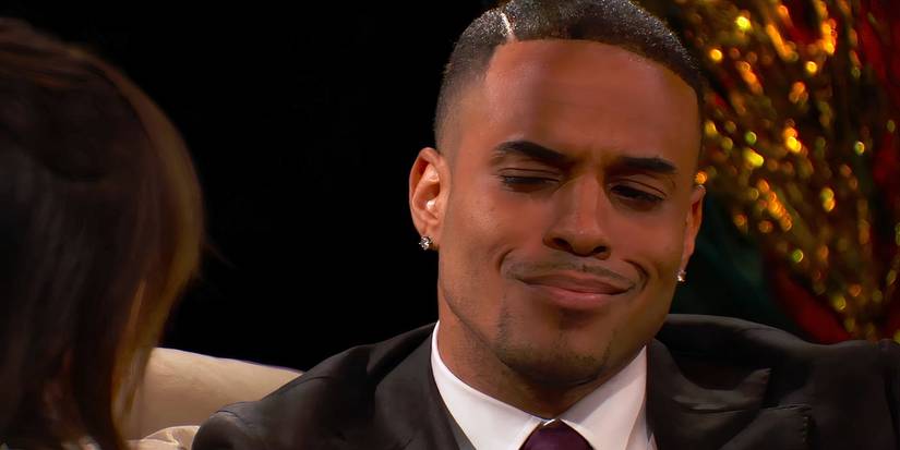 Grant Ellis grimaces with his eyes closed on The Bachelor
