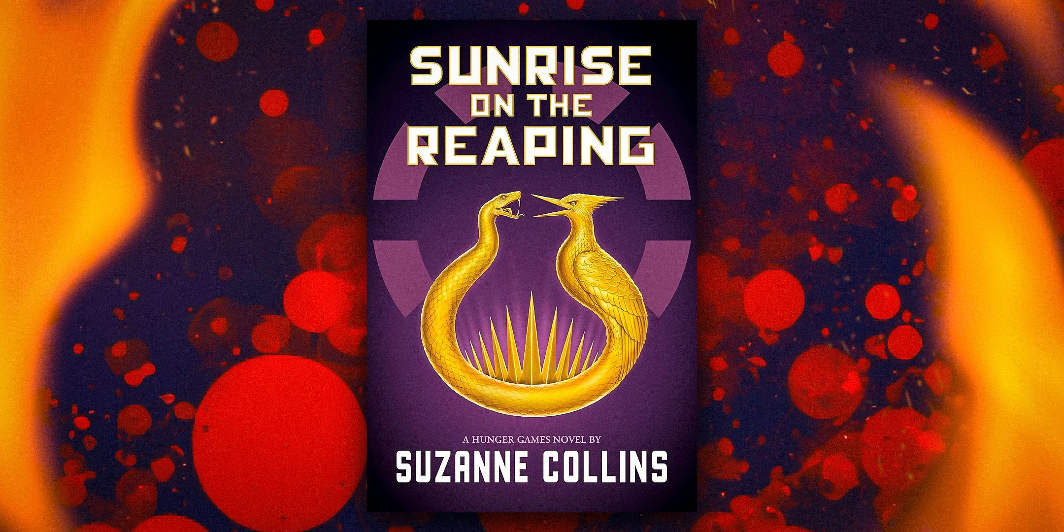 The cover of The Hunger Games: Sunrise on the Reaping with a purple background, red dots, and fire on the edges