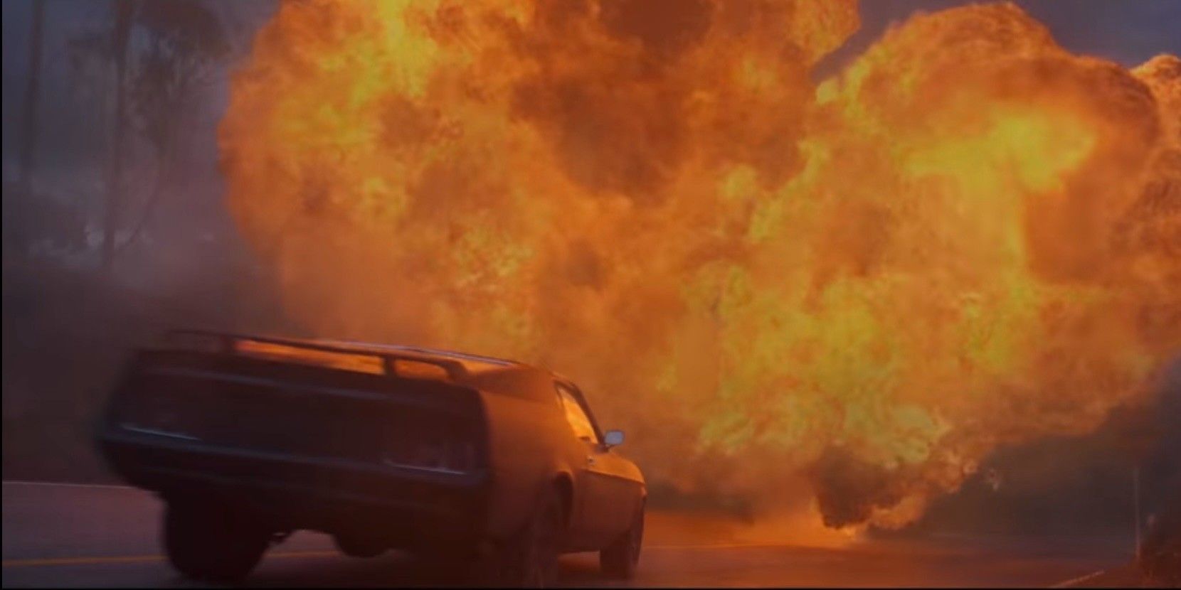 Car driving into flames in Shadow Force Trailer