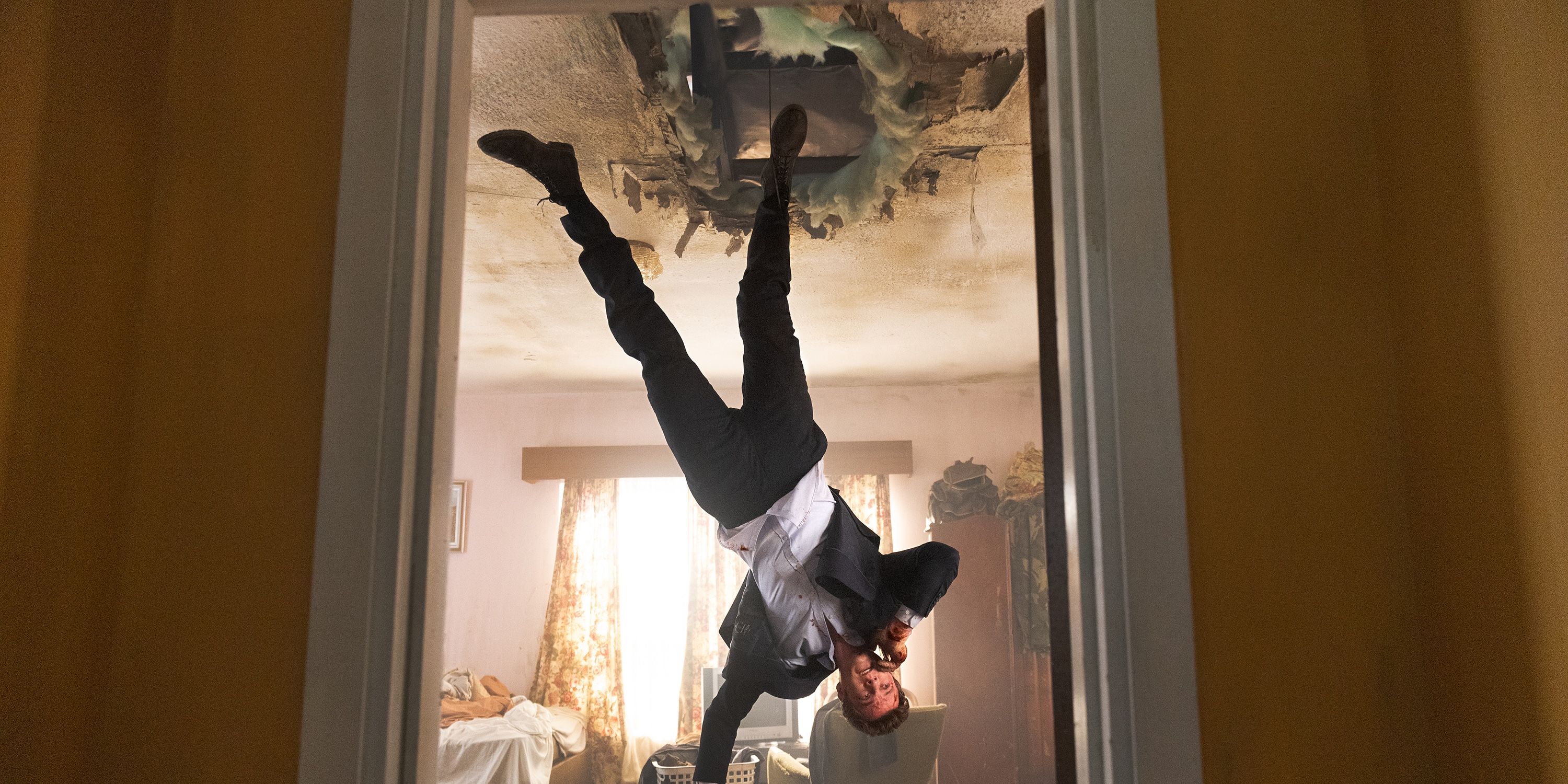 Jack Quaid hangs upside down in Novocaine