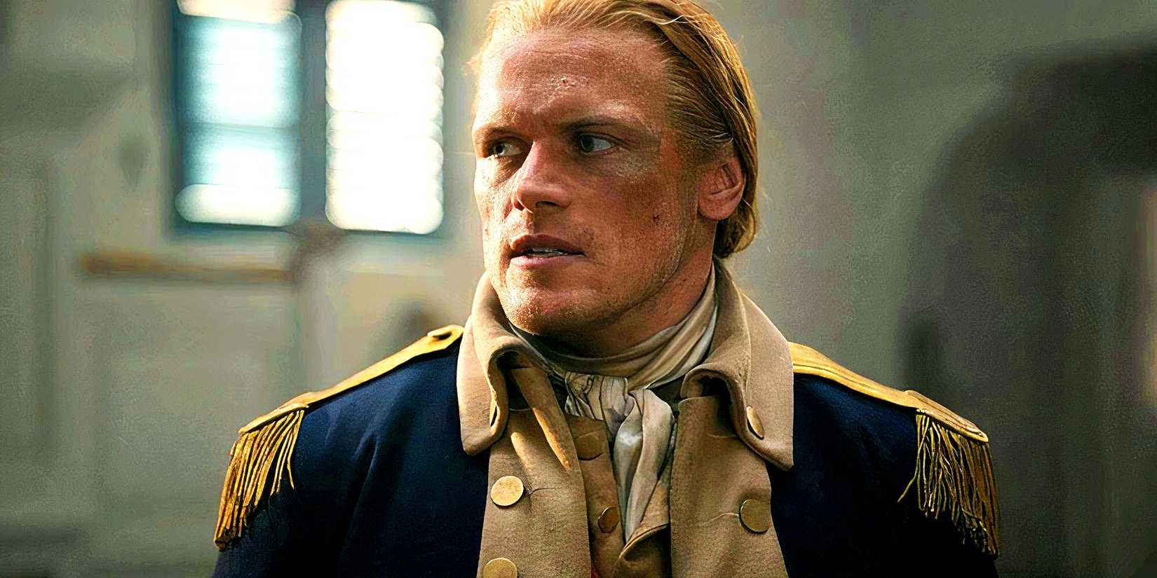 Jamie looking defiantly at something in Outlander