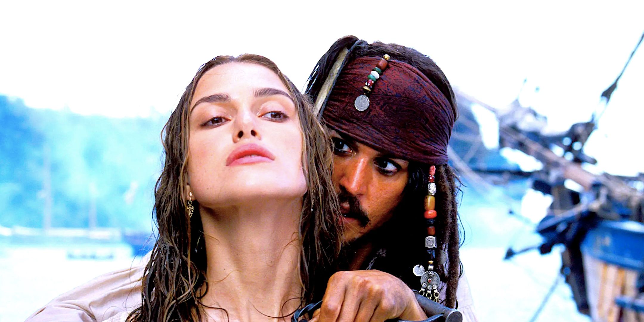 Johnny Depp's Jack Sparrow holds a knife to Kiera Knightley's Elizabeth's throat in Pirates of the Caribbean