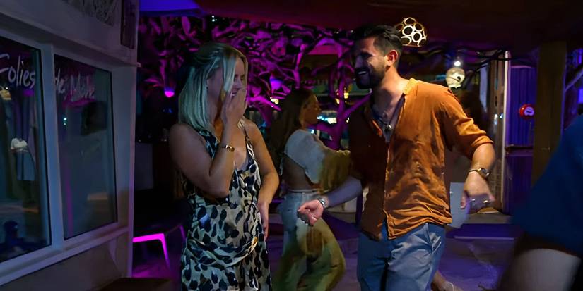 Johnny Arvanitis dancing while Alesia Harris hides her laughter on Below Deck Down Under