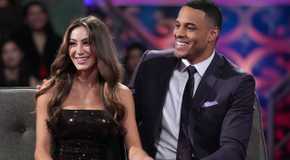 Juliana Pasquaroa and Grant Ellis sit together with wide smiles on The Bachelor