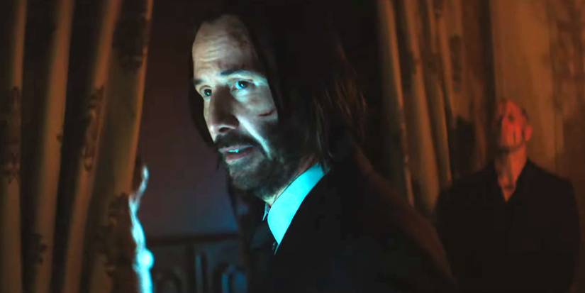 John Wick (Keanu Reeves) looking over his shoulder in Ballerina