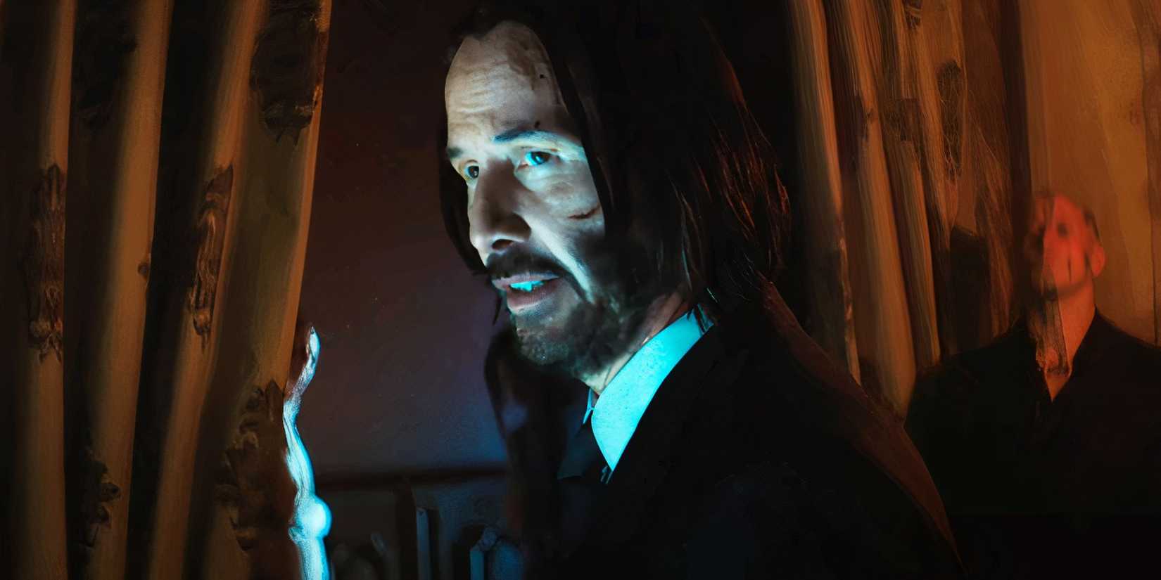 Keanu Reeves looking over one shoulder as John Wick in Ballerina