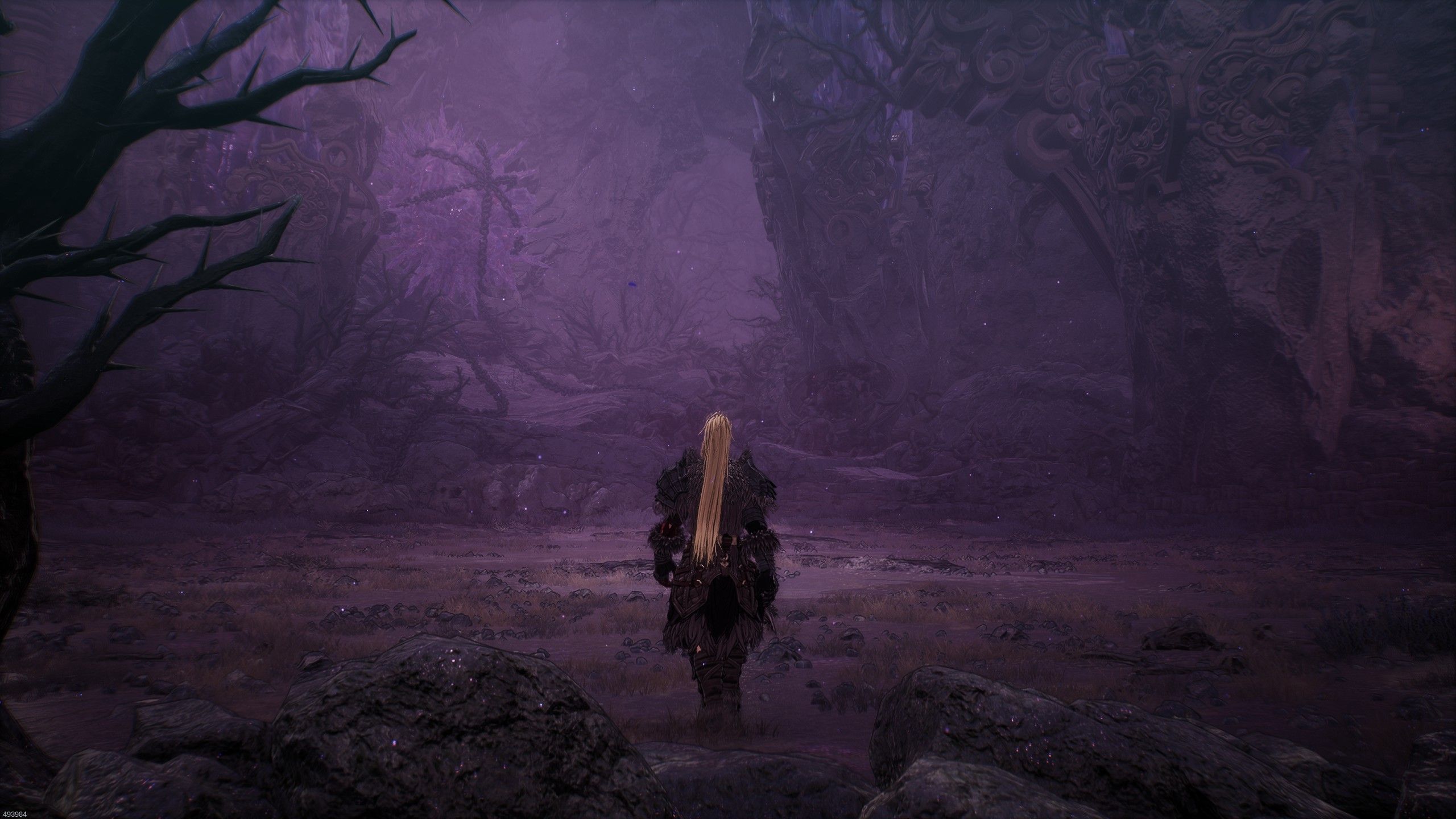 Khazan steps through a purple-tinged chaos-corrupted forest in The First Berserker Khazan