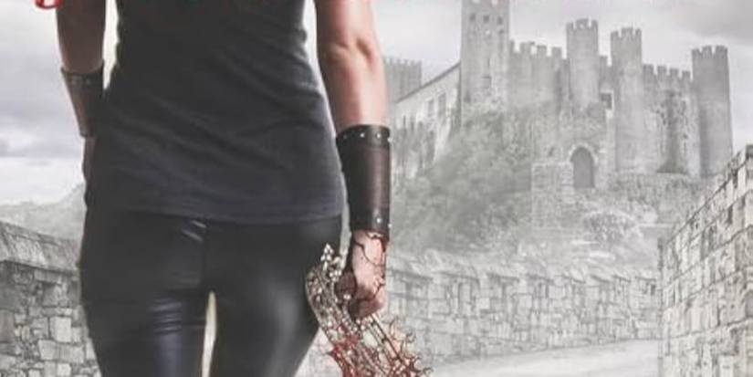Kill The Queen Cover featuring the back of a woman wearing black and holding a bloody crown as she approaches a castle