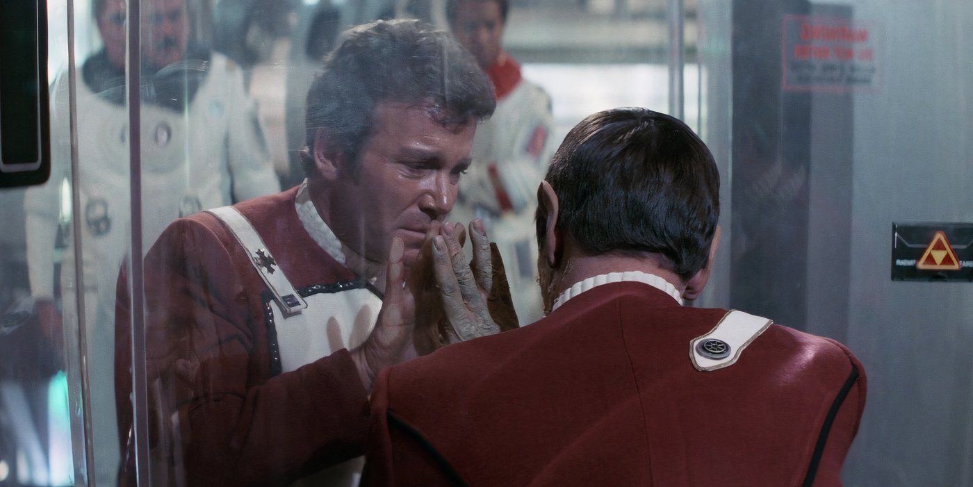 Kirk looks through glass at Spock as he dies in Star Trek II: The Wrath of Khan