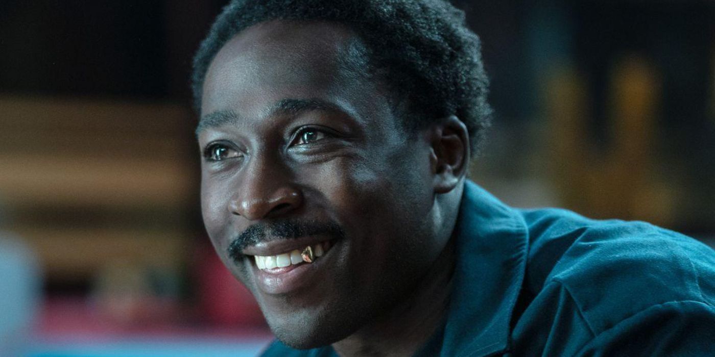 Lamar Silas (Eric Kofi-Abrefa) smiling in BMF.