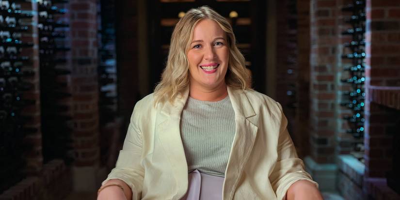 Million Dollar Secret season 1 Lauren Jean in a warmly lit setting with wine racks in the background