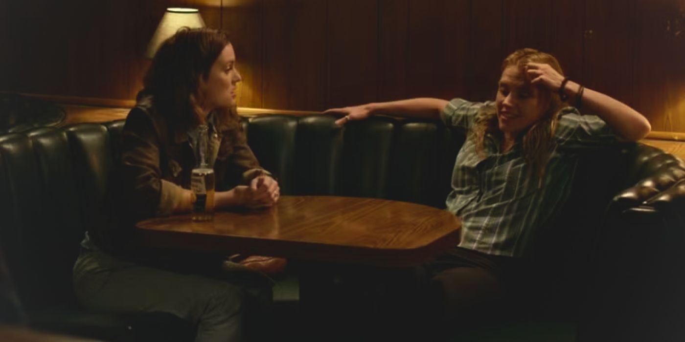 Leighton Meester and Kate McKinnon sitting awkwardly at a table in Life Partners