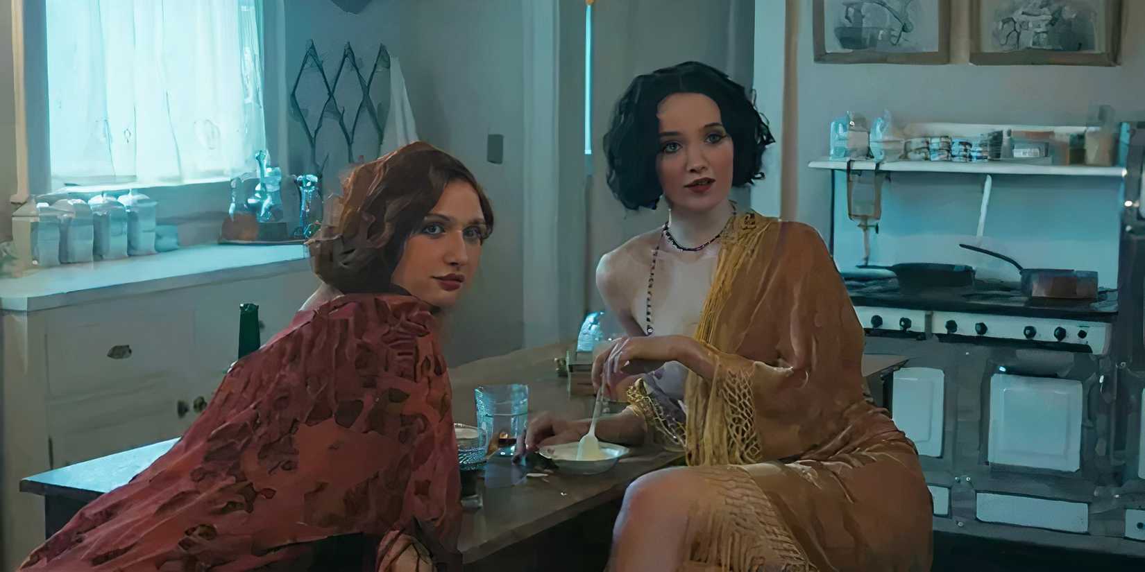 Lindy and Christy sitting in the kitchen in 1923