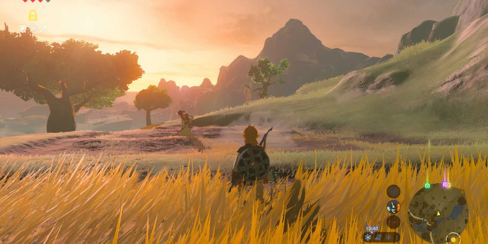 Link standing in a field in Breath of the Wild.