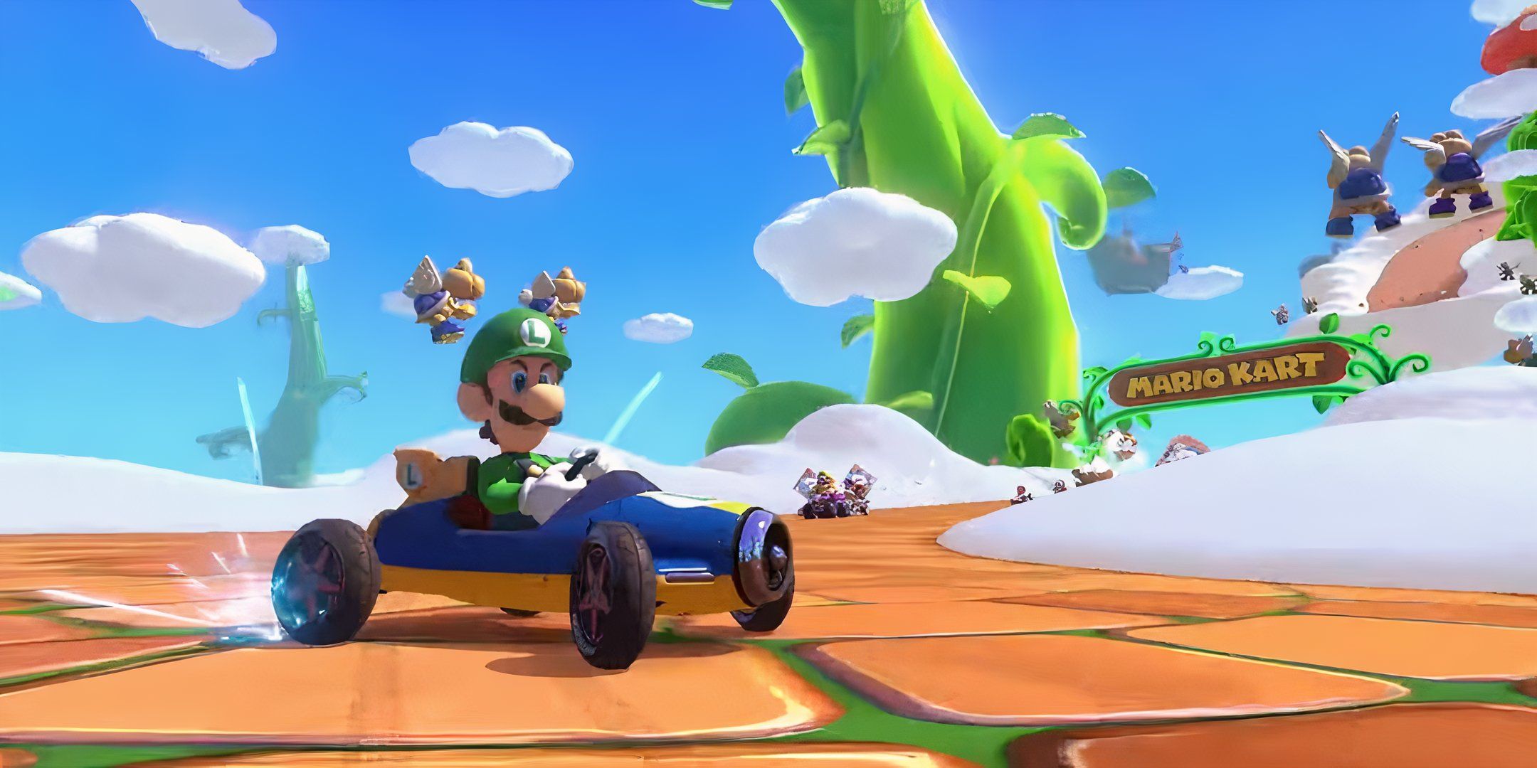 Luigi races across Sky Garden in Mario Kart 8 Deluxe, as Paratroopas fly above him.