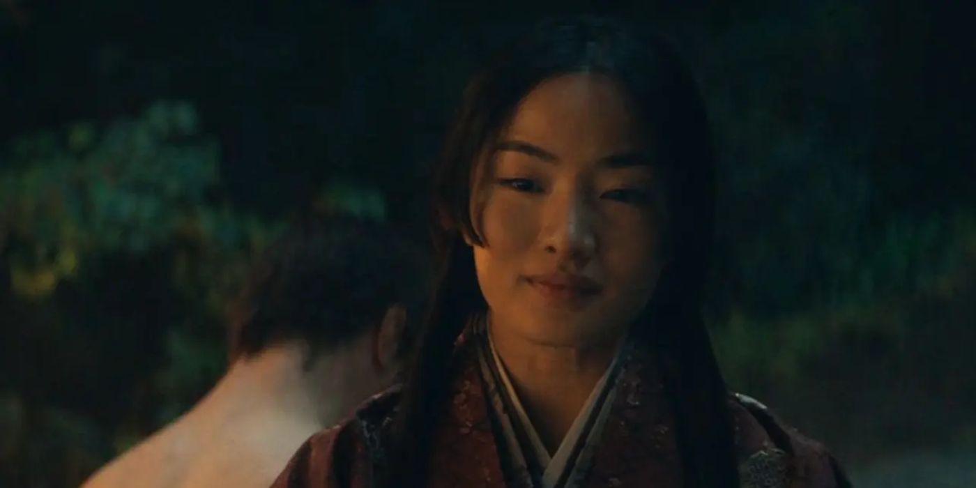 Mariko (Anna Sawai) sitting behind Blackthorne (Cosmo Jarvis) in the bath in Shogun episode 4.