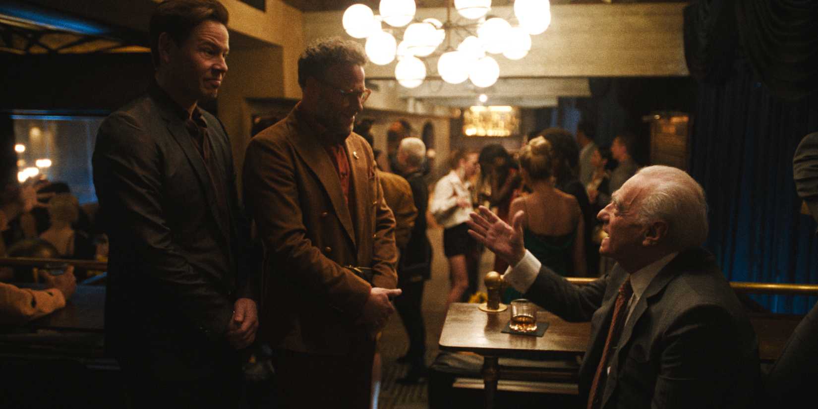 Martin Scorsese talking to Matt and Sal as they awkwardly stand at a party in The Studio