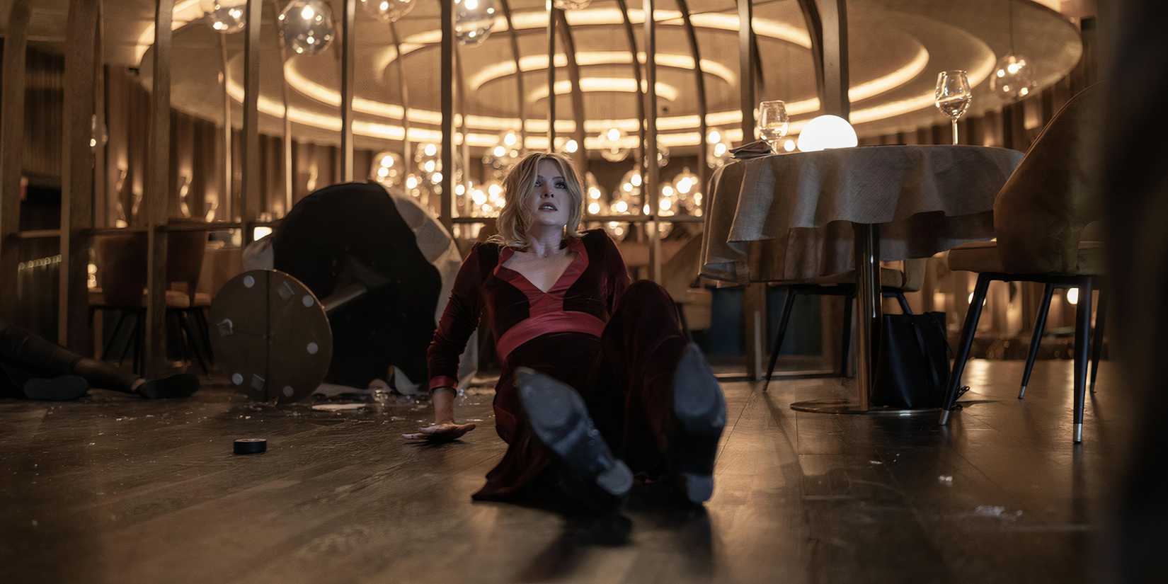 Meghann Fahy as Violet on the floor in Drop still