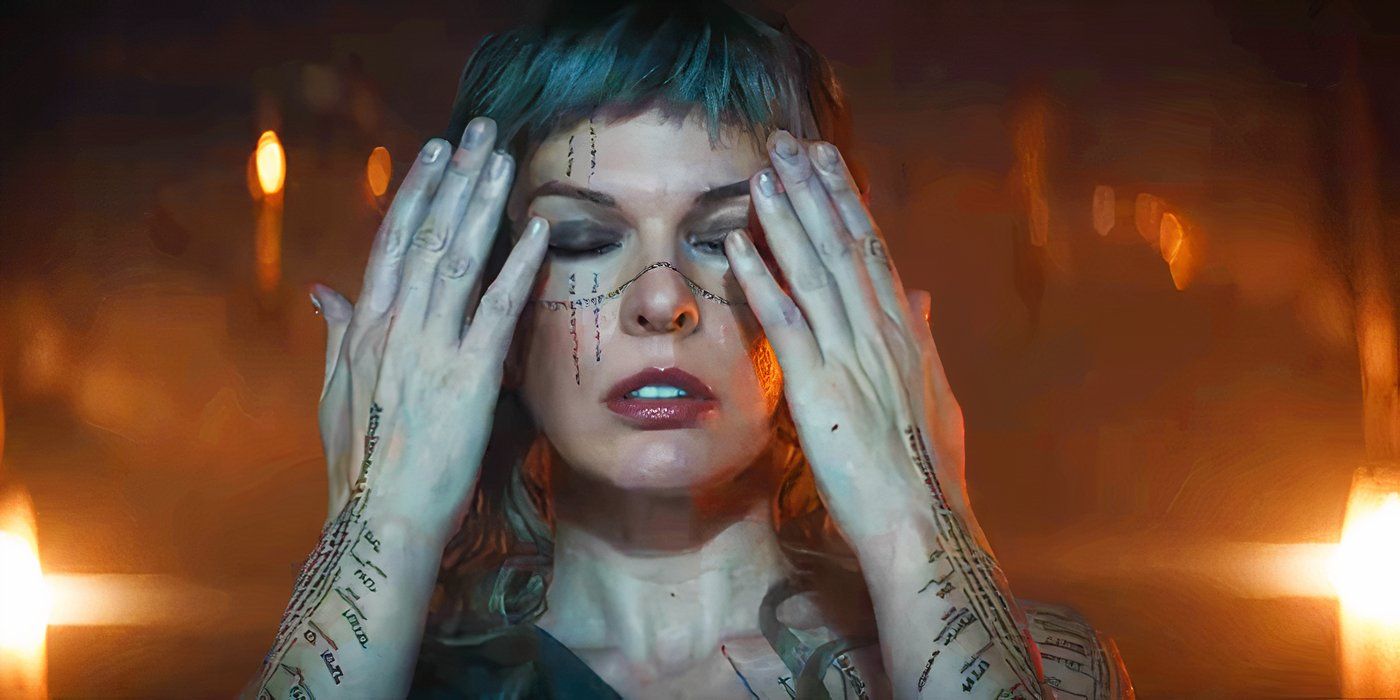 Milla Jovovich covering her eyes in In the Lost Lands