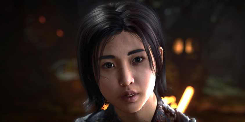 Naoe Assassin's Creed Shadows looking interested at camera.