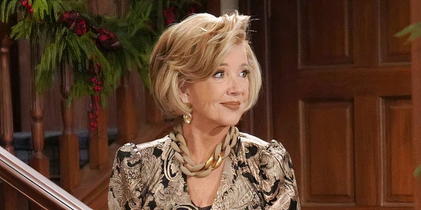 Nikki Newman by a staircase in The Young and the Restless